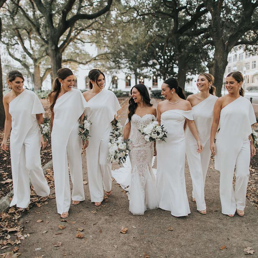 bride and bridesmaids in jumpsuits