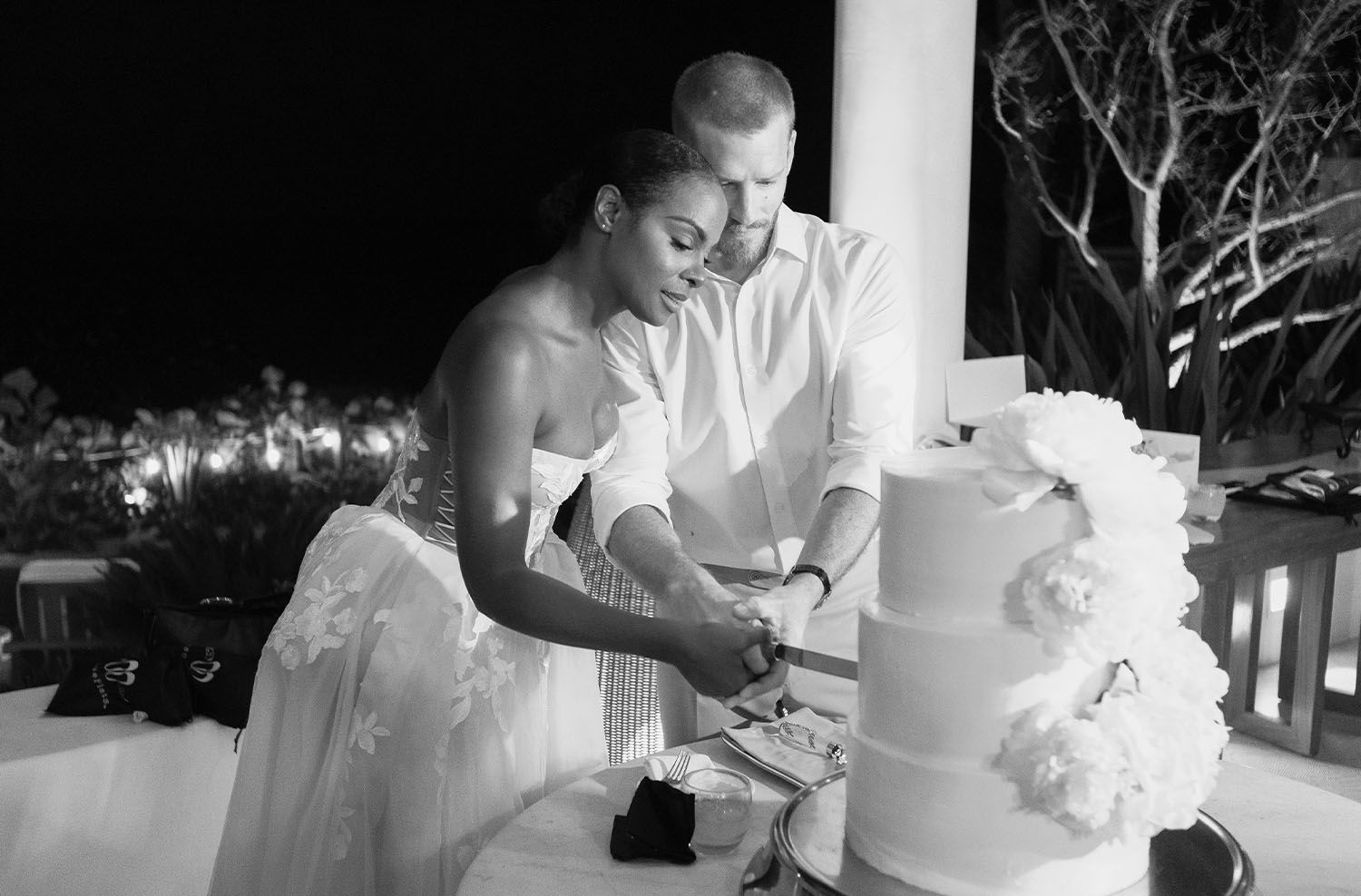 Tika Sumpter and Nick James Cutting Wedding Cake