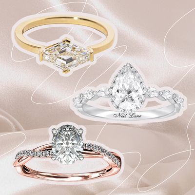 Three engagement rings on a beige background