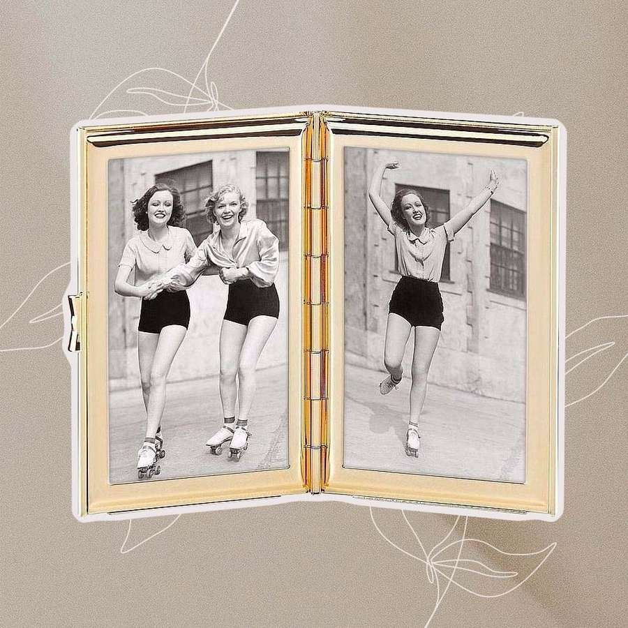 Kate Spade New York Garden Drive Hinged Pocket Frame on a beige background