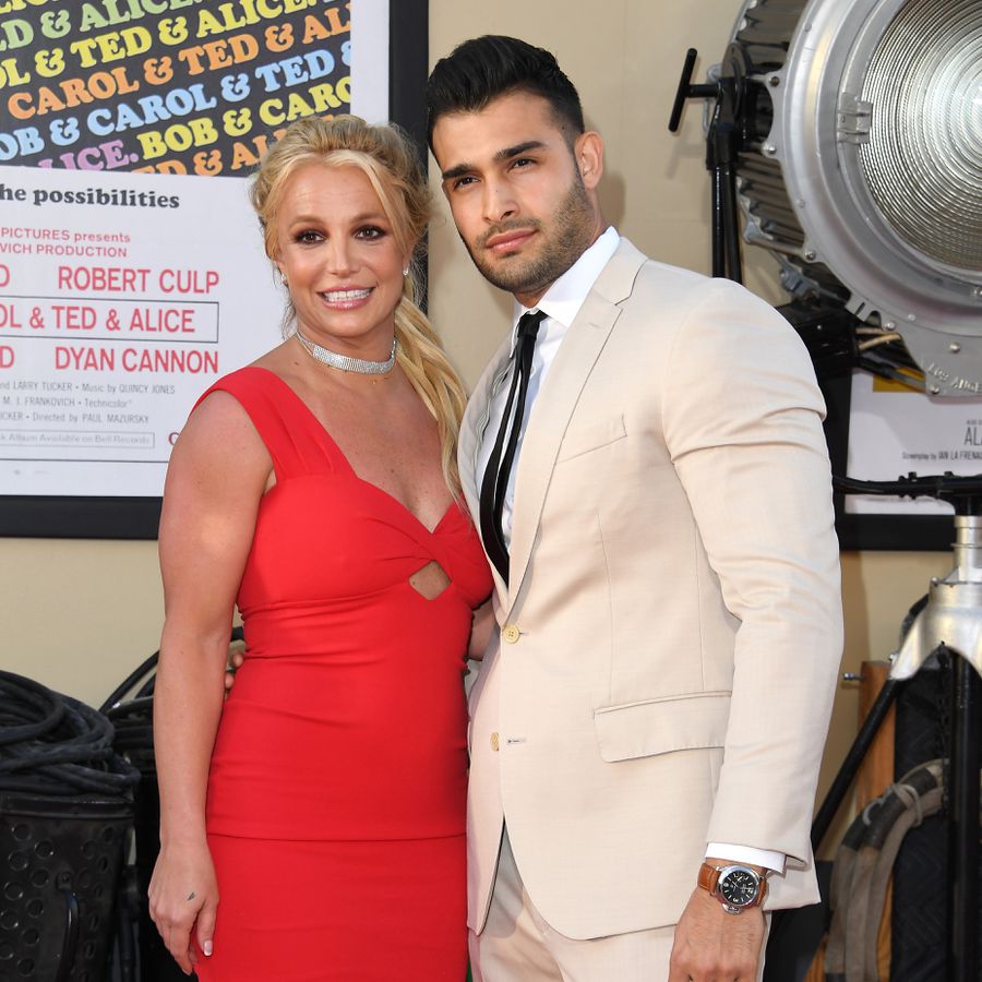 Britney Spears and Sam Asghari posing at "Once Upon a Time in Hollywood" Premiere