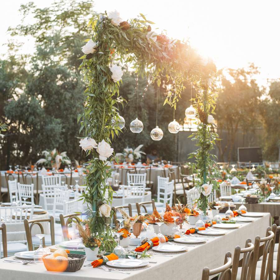 Tables set for an outdoor event dinner