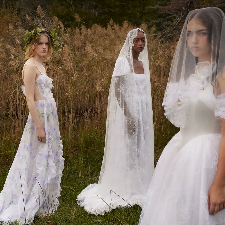 HONOR BFW Collection models wearing vintage-inspired wedding dresses in a corn field