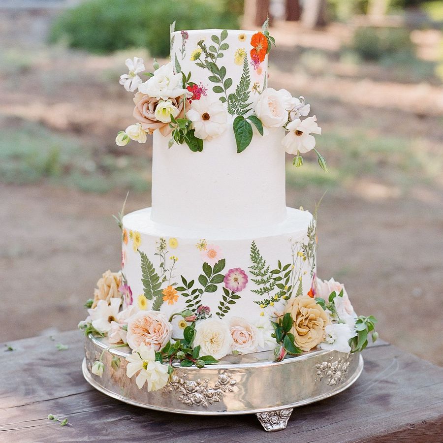 wedding cake with flowers and greenery