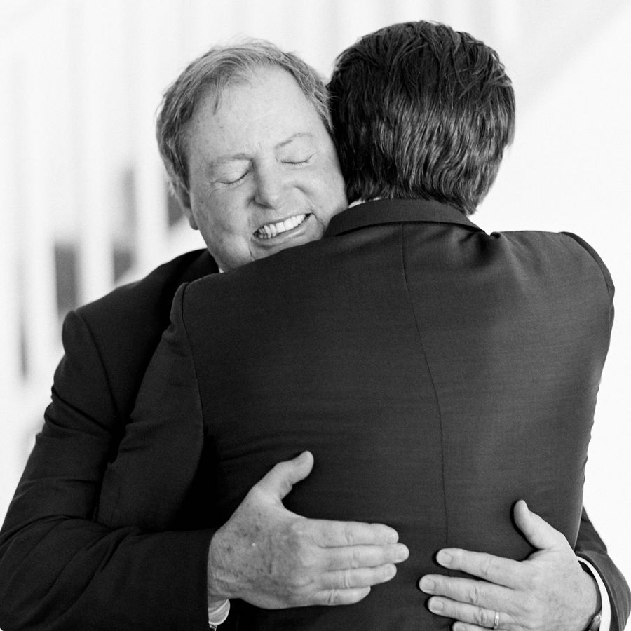 Father hugging future son-in-law