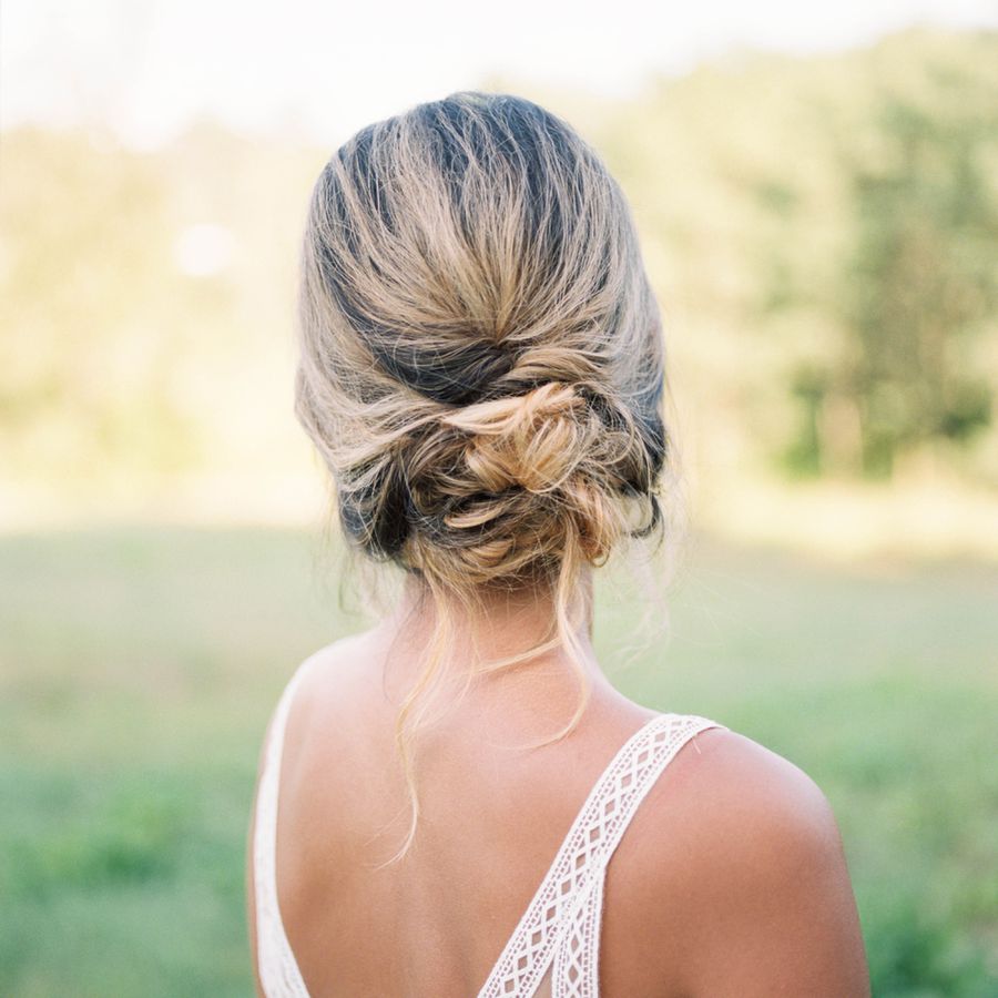 Bride in Wedding Dress with Low, Twisted Updo
