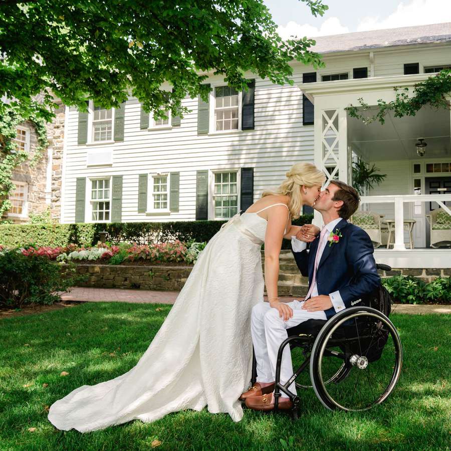 bride and groom in a wheelchair