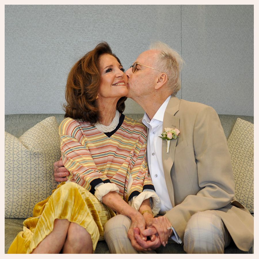 Gloria Lushing and Arnold Gilberg kiss