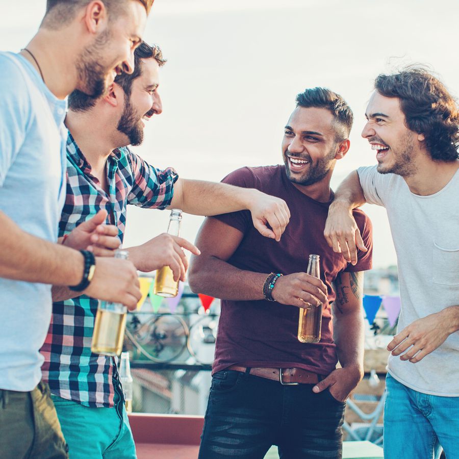 men drinking beer at bachelor party