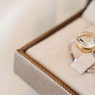 Gold and silver diamond engagement ring in box