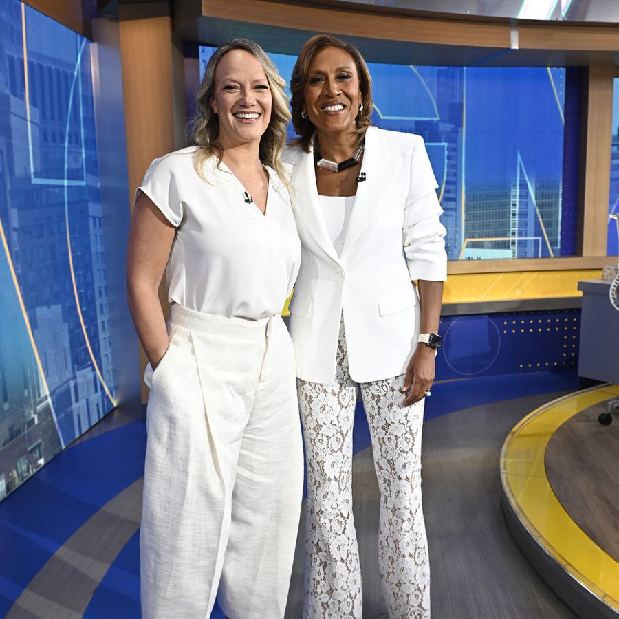 Robin Roberts and Amber Laign dressed in bridal whites on set of Good Morning America for joint bachelorette party