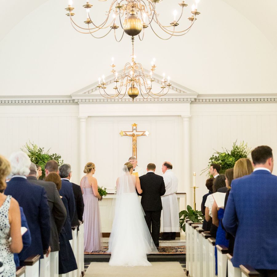 Bride and Groom Exchanging Vows at the Altar During a Christian Wedding Ceremony