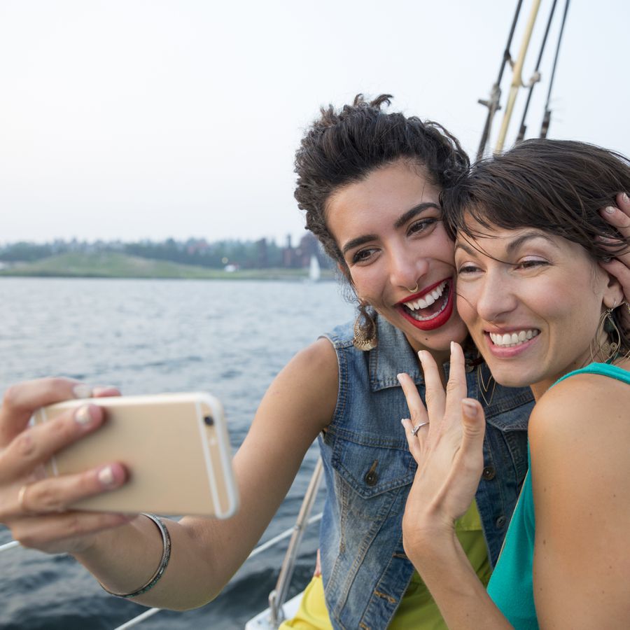 engaged couple taking a selfie