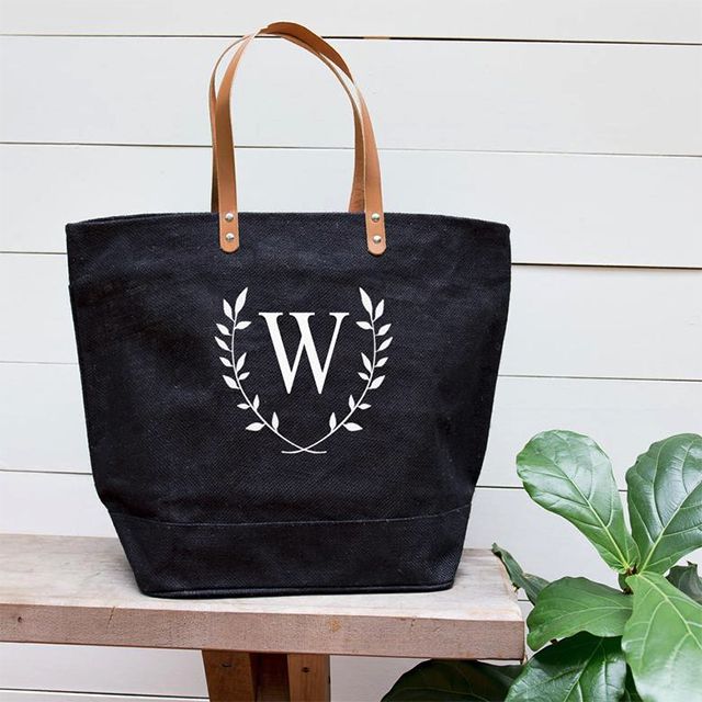 Totes Burlap Personalized Floral Tote Bag on a bench