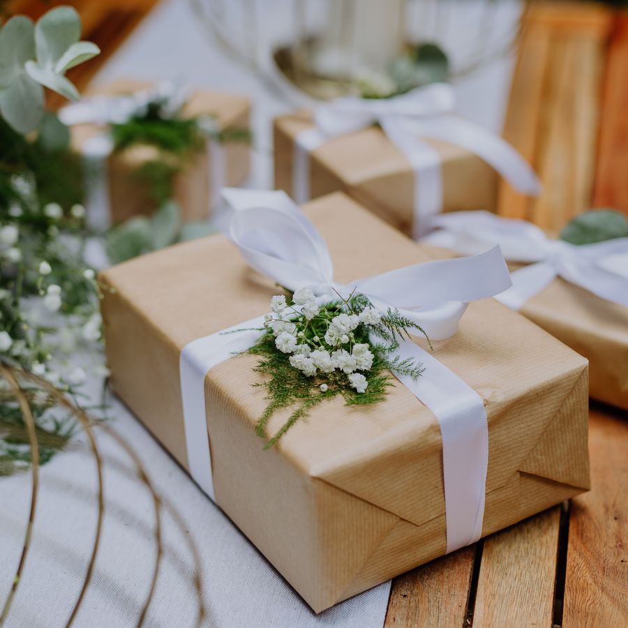 wedding gift wrapped in eco paper packaging and flower decoration