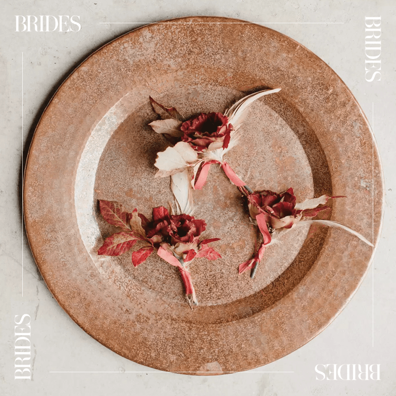 Fall Boutonnieres with rusted leaves on copper plate